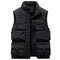 Veste saharienne sans manche de couleur noire, dotée de multiples poches fonctionnelles sur le devant pour un maximum de praticité. Le col montant et la fermeture éclair intégrale ajoutent une couche supplémentaire de protection contre les éléments, faisant de cette veste un choix idéal pour les activités extérieures en conditions froides.
